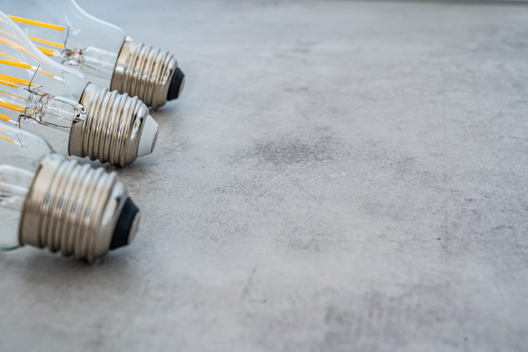 photo of lightbulbs on gray surface